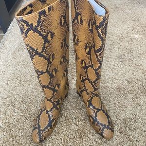 Tall snake embossed boots